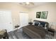 Virtually staged bedroom with a large bed and ample closet space at 2642 Magnolia Cir, Lake Wales, FL 33898