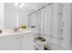 Simple bathroom with single vanity, toilet, and shower/tub combo at 2660 Oneida Loop, Kissimmee, FL 34747