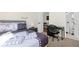Cozy bedroom with a queen bed, workspace, and access to a private bath at 2660 Oneida Loop, Kissimmee, FL 34747