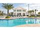 Resort-style pool with a large cabana and plenty of lounge chairs at 2736 Bookmark Dr, Kissimmee, FL 34746