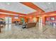 Spacious community room with comfortable seating and TV at 2856 Oakwater Dr # 2856, Kissimmee, FL 34747