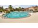Inviting community pool with surrounding lounge chairs at 2856 Oakwater Dr # 2856, Kissimmee, FL 34747