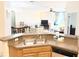 Kitchen with a breakfast bar overlooking the living room at 2856 Oakwater Dr # 2856, Kissimmee, FL 34747