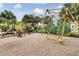 playground with climbing structures and slides at 2856 Oakwater Dr # 2856, Kissimmee, FL 34747