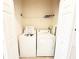 Convenient laundry closet with washer and dryer at 2856 Oakwater Dr # 2856, Kissimmee, FL 34747