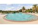 Resort-style pool with plenty of lounge chairs at 2856 Oakwater Dr # 2856, Kissimmee, FL 34747