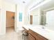 Bathroom with double vanity, toilet and walk-in shower at 2856 Oakwater Dr # 2856, Kissimmee, FL 34747
