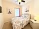 Bright bedroom with Eiffel Tower decor and comfortable bedding at 2856 Oakwater Dr # 2856, Kissimmee, FL 34747