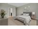 Spacious bedroom with access to bathroom and ample natural light at 3577 Dahlia Dr, Lake Hamilton, FL 33851
