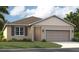 One-story house with a two-car garage and front yard at 3577 Dahlia Dr, Lake Hamilton, FL 33851
