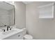 Updated bathroom with white vanity, marble shower, and modern fixtures at 3618 Wellington Ln, Bartow, FL 33830