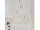 Elegant bathtub with marble-look wall tile at 3618 Wellington Ln, Bartow, FL 33830