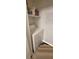 Laundry closet with washer, dryer, and overhead shelving at 4400 Thornbriar Ln # 201, Orlando, FL 32822