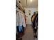 Large walk-in closet with double hanging rods at 4400 Thornbriar Ln # 201, Orlando, FL 32822