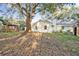 Large backyard with spacious lawn and gazebo at 5105 Forestgreen W Dr, Lakeland, FL 33811