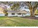 Charming ranch house with mature landscaping at 5105 Forestgreen W Dr, Lakeland, FL 33811