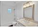 Clean bathroom with white subway tile and updated vanity at 5105 Forestgreen W Dr, Lakeland, FL 33811