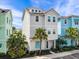 Two story beach style home with palm trees at 8020 Shaker St, Kissimmee, FL 34747
