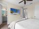 Bedroom with TV and en-suite bathroom access at 8020 Shaker St, Kissimmee, FL 34747