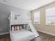 bedroom with a bunk bed and slide at 8020 Shaker St, Kissimmee, FL 34747