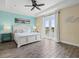 Spacious main bedroom with water views and king-size bed at 8020 Shaker St, Kissimmee, FL 34747