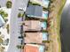 Aerial view of house with private pool, near other houses and a lake at 8020 Shaker St, Kissimmee, FL 34747
