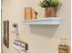 Decorative shelving with coastal-themed decor at 8020 Shaker St, Kissimmee, FL 34747