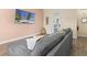 Relaxing living room with sectional sofa and large TV at 8020 Shaker St, Kissimmee, FL 34747