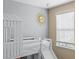 bedroom with bunk bed and slide, good natural light at 8020 Shaker St, Kissimmee, FL 34747