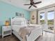 Main bedroom with water view and king-size bed at 8020 Shaker St, Kissimmee, FL 34747