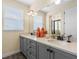 Double vanity with quartz countertop and modern fixtures at 8020 Shaker St, Kissimmee, FL 34747
