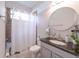 Clean bathroom with a single sink and a shower/tub combo at 9036 Arbors Edge Trl, Windermere, FL 34786