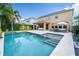 Stunning pool and patio area, perfect for outdoor entertaining at 9036 Arbors Edge Trl, Windermere, FL 34786