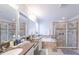 Elegant bathroom with double sinks, granite countertop, and a large shower at 9036 Arbors Edge Trl, Windermere, FL 34786