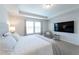 Spacious main bedroom with king-size bed and large windows at 9036 Arbors Edge Trl, Windermere, FL 34786