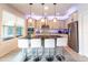 Modern kitchen with an island, stainless steel appliances, and white cabinets at 9036 Arbors Edge Trl, Windermere, FL 34786
