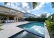 Large pool with patio and outdoor seating at 9036 Arbors Edge Trl, Windermere, FL 34786