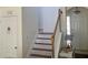 View of the staircase and entryway at 148 Brunello Dr, Davenport, FL 33897