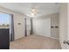 Well-lit bedroom with carpeted floors and a double door closet at 2056 Marabou Dr, Davenport, FL 33896