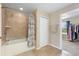 Bathroom with shower/tub combo and tile flooring at 2056 Marabou Dr, Davenport, FL 33896