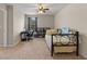 Bedroom with daybed, workspace, and built-in shelving at 2056 Marabou Dr, Davenport, FL 33896