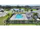 Community pool with cabana and landscaping at 2056 Marabou Dr, Davenport, FL 33896