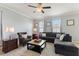 Relaxing living room with sectional sofa and accent chair at 2056 Marabou Dr, Davenport, FL 33896