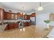 Kitchen with granite countertops and stainless steel appliances at 2056 Marabou Dr, Davenport, FL 33896