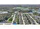 Aerial perspective of house and surrounding community at 2056 Marabou Dr, Davenport, FL 33896