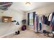 Large walk-in closet with plenty of shelving and hanging space at 2056 Marabou Dr, Davenport, FL 33896