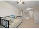 Upper hallway with a daybed and access to other rooms at 2056 Marabou Dr, Davenport, FL 33896