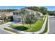 Two-story house with a front yard and driveway at 2056 Marabou Dr, Davenport, FL 33896