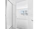 Bright bathroom with a shower and an open view to a bedroom at 27472 Black Kite Ave, Howey In The Hills, FL 34737