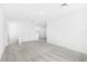 Spacious loft area with grey carpet and recessed lighting at 27472 Black Kite Ave, Howey In The Hills, FL 34737
